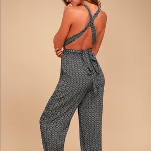 Lulu’s “Take A Trip Black Print Halter Jumpsuit”